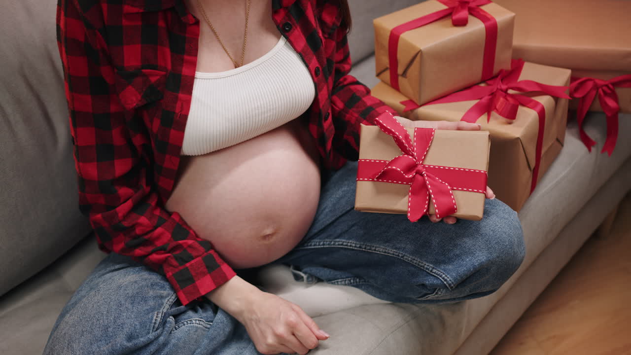 Pregnant woman with gift