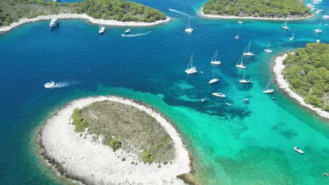 scenic aerial view of the paklinski islands near hvar, croatia, surrounded by turquoise waters and yachts anchored along the coast