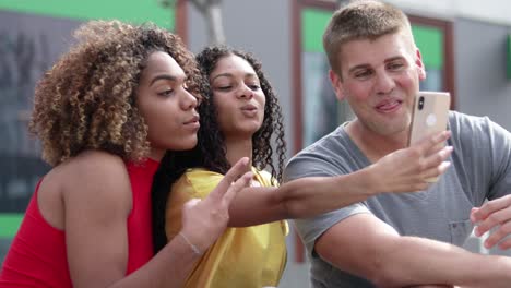 happy friends taking selfie outdoor