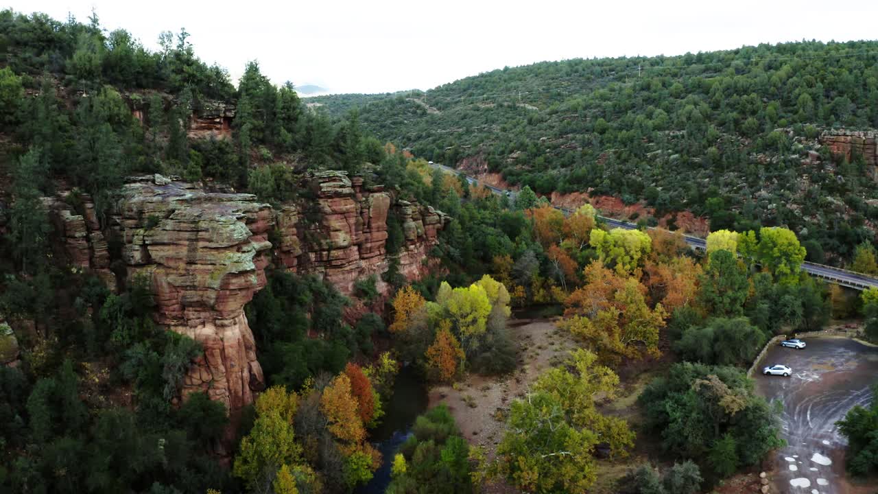 Drone shot over Arizona's lush forest surrounding the East Verde River near Payson, Arizona