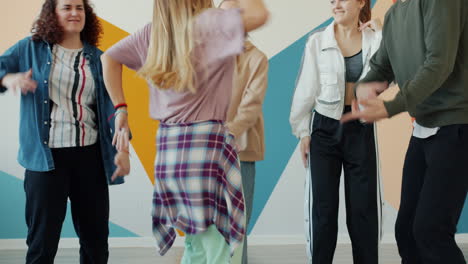 teenage girls dancing in a dance studio
