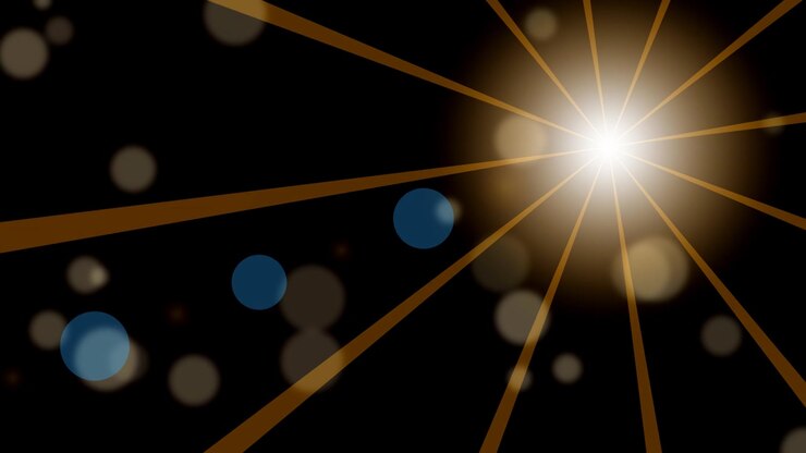 Sfondo astratto con raggi di luce dorati e particelle bokeh fluttuanti