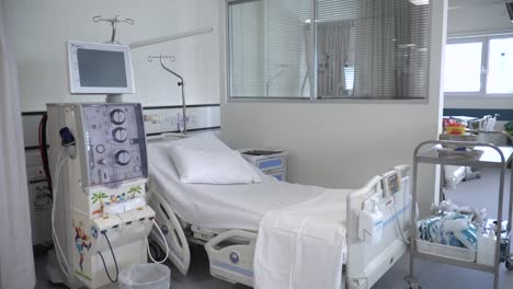 view of an empty dialysis treatment room in a hospital or health clinic