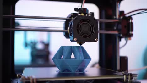captivating progress of an intricate 3d print: a focus on layer development in a modern 3d printer capturing a unique geometric design