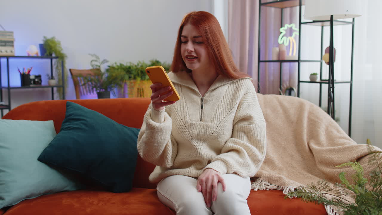 Sad young woman use smartphone surprised by bad news fortune loss fail lottery results deadline