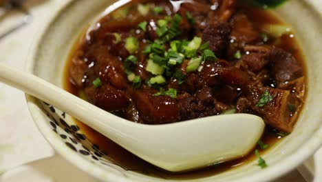 savoring a flavorful beef and vegetable dish