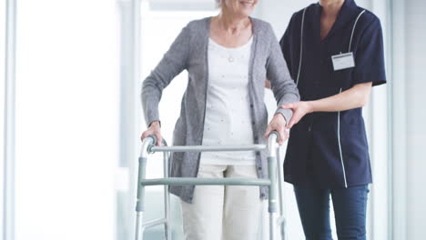 a-nurse-assisting-a-senior-woman-with-a-walker