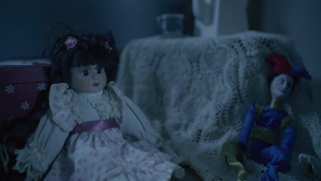 vintage dolls and jester figure