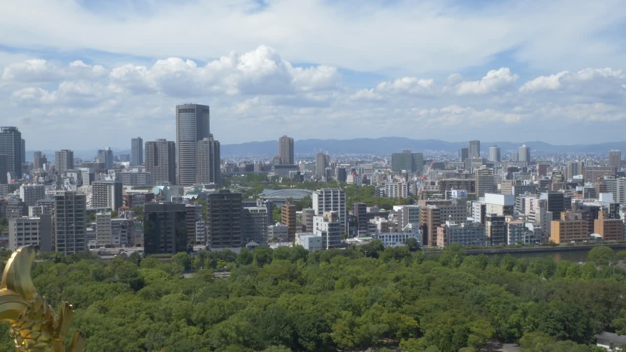 City High-Rise Buildings Near Osaka Castle Park In Osaka, Japan. Aerial Wide Shot