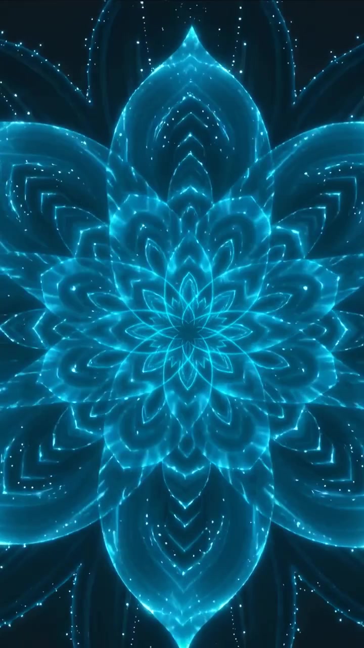 Video verticale: Avvio riproduzione di un mandala blu neon che respira, ruota e invia scintille nel vuoto oscuro