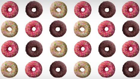 abstract animation of set of various colorful donuts. different directional orientations, vibrating against a white background