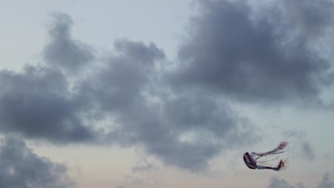 Kite-flying-with-the-heavy-breeze-in-Galle-Fort-at-Golden-Sunset-Orange-and-dark-clouds-in-the-sky