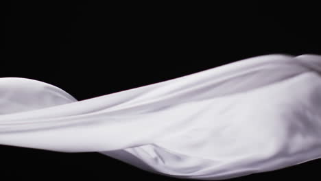 animación de tejido blanco soplado con espacio de copia sobre fondo negro