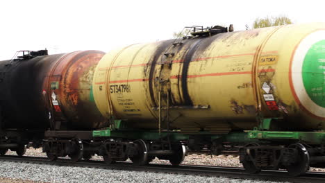 Freight-train-passing-by-slowly-in-the-country