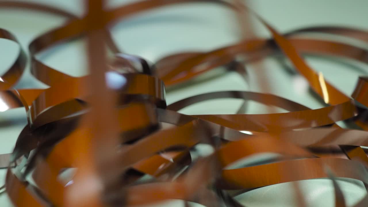 Tape Unreel. Pulling the tape out. Destroying cassette tape media. Scene A