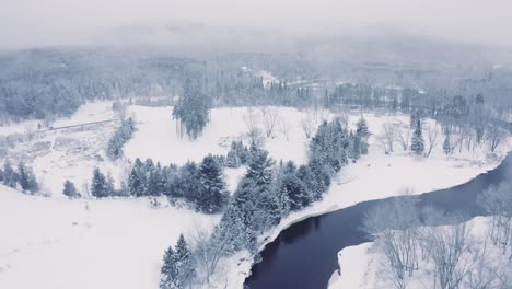 Foggy-Winter-Landscape---Drone-Flying-4K---Mountains---Trees,-rivers,-snowy---Cinematic-river