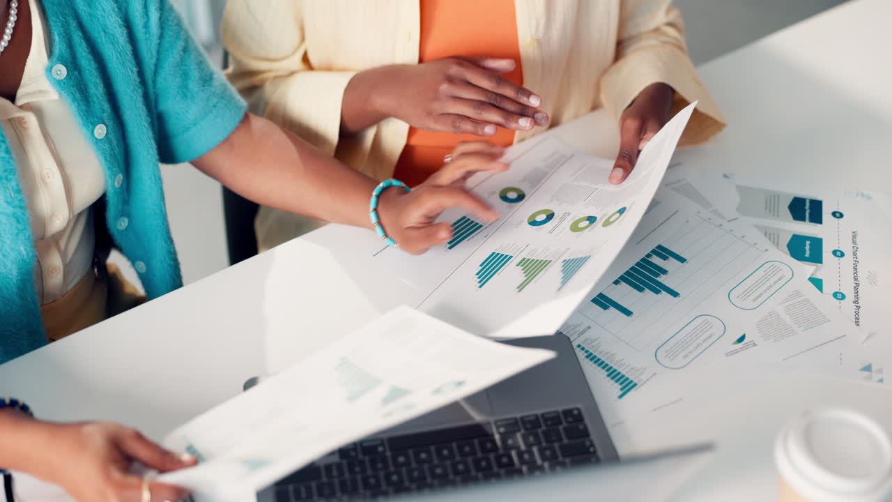 Business Professionals Analyzing Data and Charts in an Office Meeting