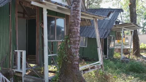 panning shot of broken down beach bungalow in thailand due to travel restrictions and boarder closures