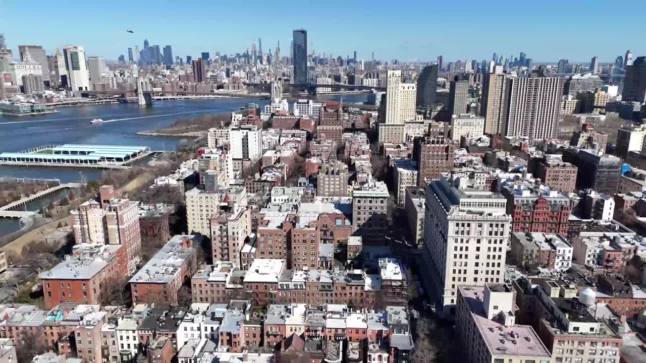 Horizontal drone side-tracking shot over Remsen Street in Brooklyn, showcasing the city's vibrant streets, historic buildings, and dynamic urban landscape with smooth lateral aerial movement.