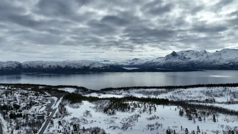 flying over extreme snowy landscape of 
narvik, norway