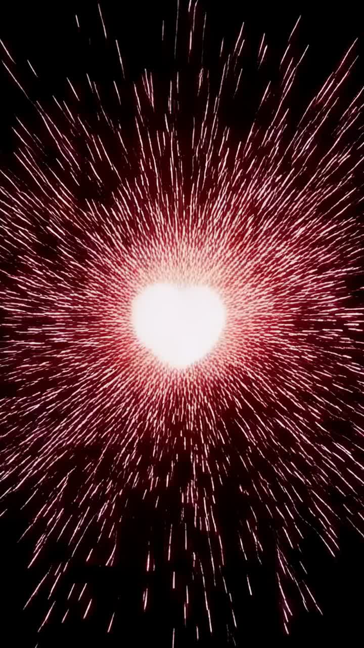 Vertical video: Pulsing glowing particle heart breaking into flowing arcs and fading sparks in void