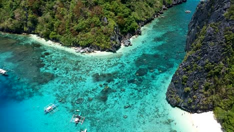 Antena-De-Playa-De-Arena-Blanca-En-La-Playa-De-La-Isla-De-Shimizu-El-Nido,-Palawan,-Filipinas