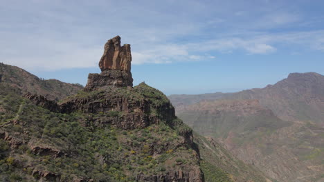 aerial shot in approach to roque mulato on the island of gran canaria on a sunny day