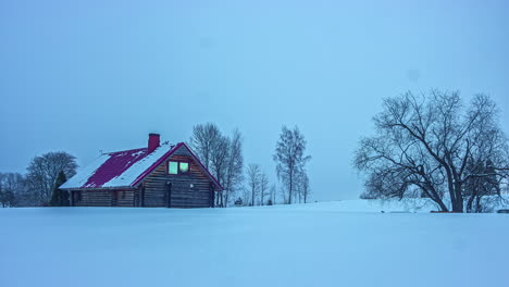 A-full-day-timelapse-of-a-log-cabin-in-a-snowstorm