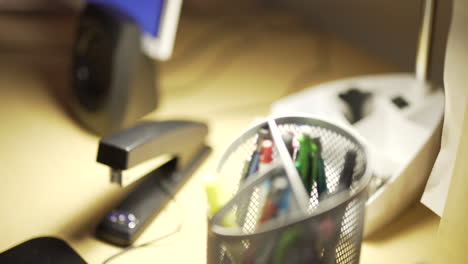 Close-Up-of-Desk-with-Manilla-File-Folders-and-Stapler