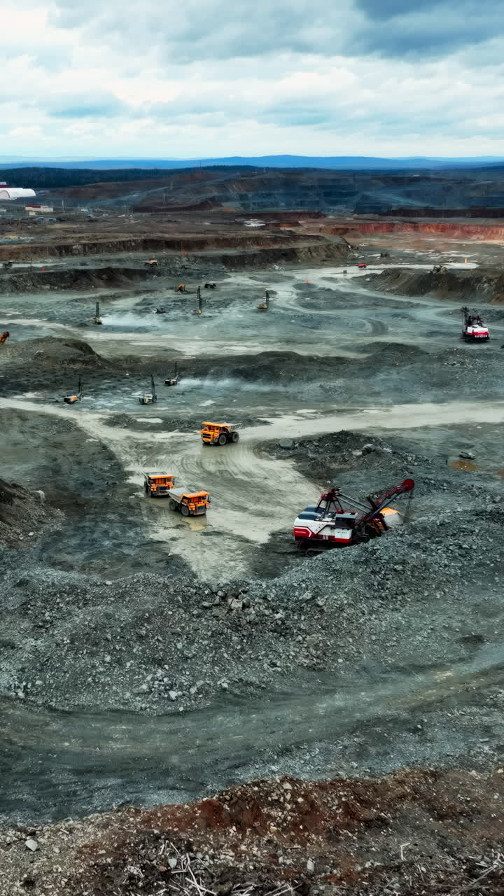 Open-Pit Mine Operation with Heavy Machinery