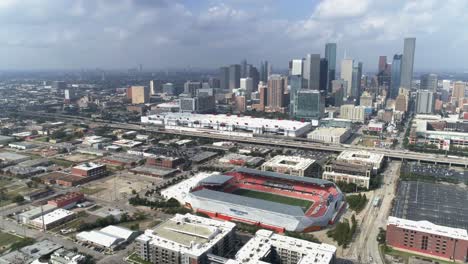 this video is of an aerial view of downtown houston skyline on a cloudy day