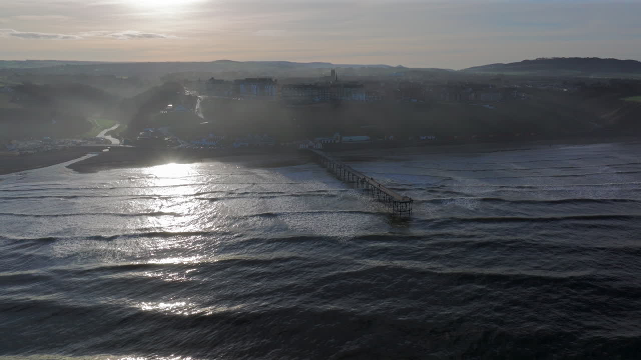 Establishing Drone Shot of Saltburn-by-the-Sea Pier and Town on Sunny Day