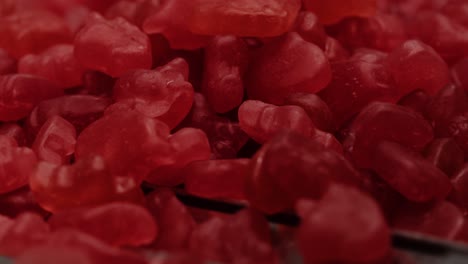 Close-up-shot-of-red-jelly-gummy-vitamins-in-nutraceutical-production-process