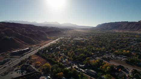 drone shot panning to the left of moab, utah at sunrise