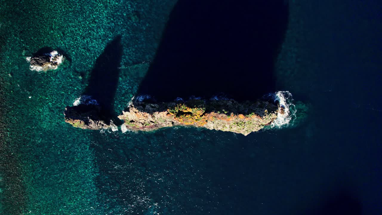 Aerial View of Rocky Island and Turquoise Water