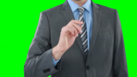 Mid-section-of-businessman-using-digital-screen