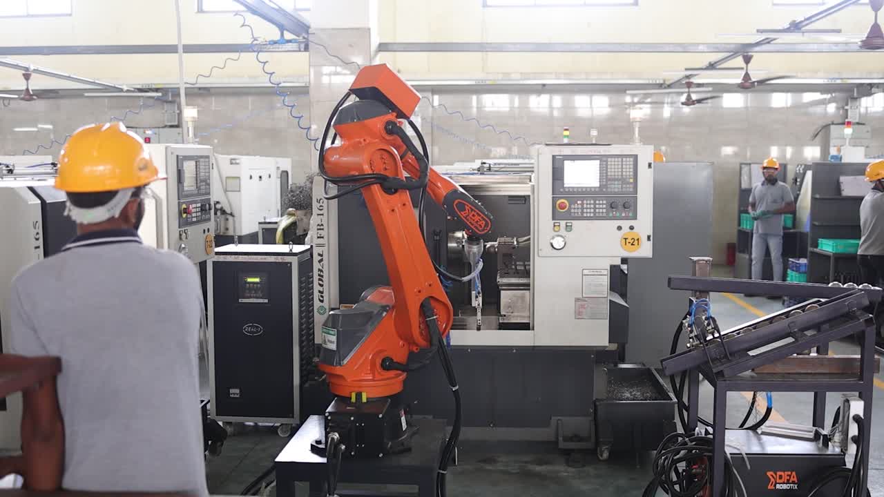 robotic arm taking a raw material in CNC machine. Industry 5.0, industrial 4.0 concept