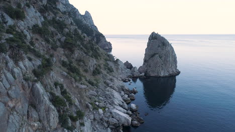 rocky coastline with a dramatic sea stack