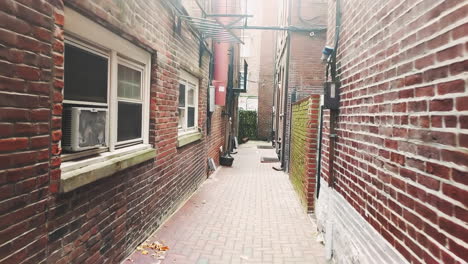 walking down an old alley by the old town church on salem street and hull street on a cloudy morning.