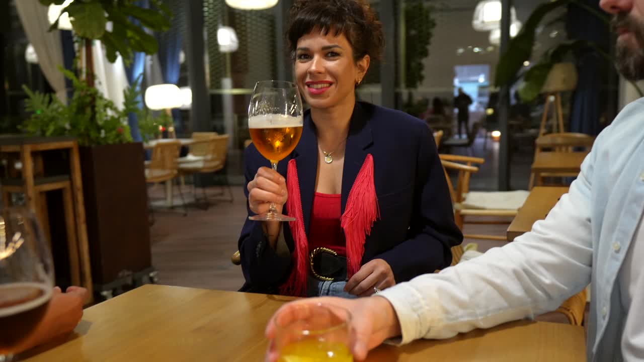 People enjoying drinks at a restaurant