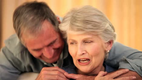 mature couple embracing and speaking to each other