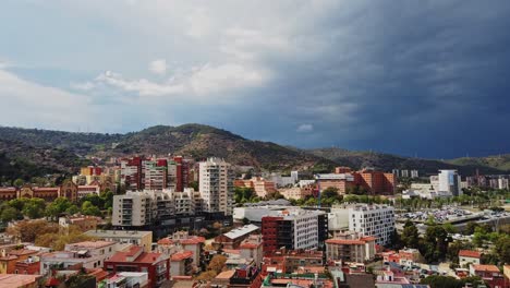 aerial hyperlapse above barcelona neighborhood hebrón valley serra de collserola from daylight to dusk