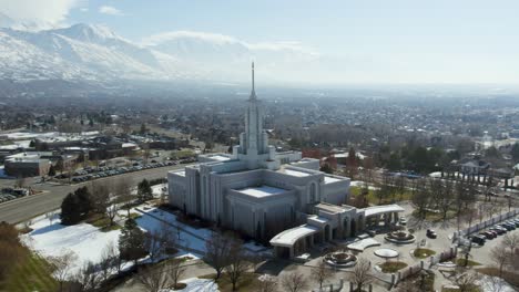 Mount-Timpanogos-LDS-Mormon-Temple-on-Utah-County-Winter-Day,-Aerial-Orbit