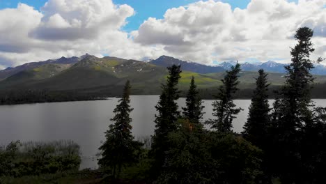 4k drone video of mountains around otto lake near healy, alaska on sunny summer day