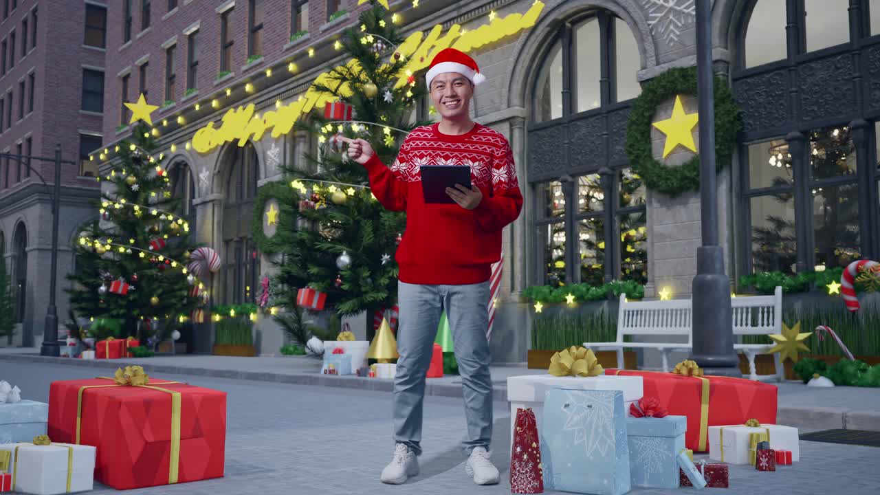 hombre con tableta delante de las decoraciones de navidad