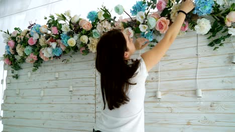 closeup beautiful florist creating spring colorful bouquet arrangement