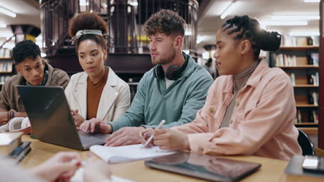 students collaborating in a library