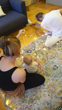 baby yoga session with family