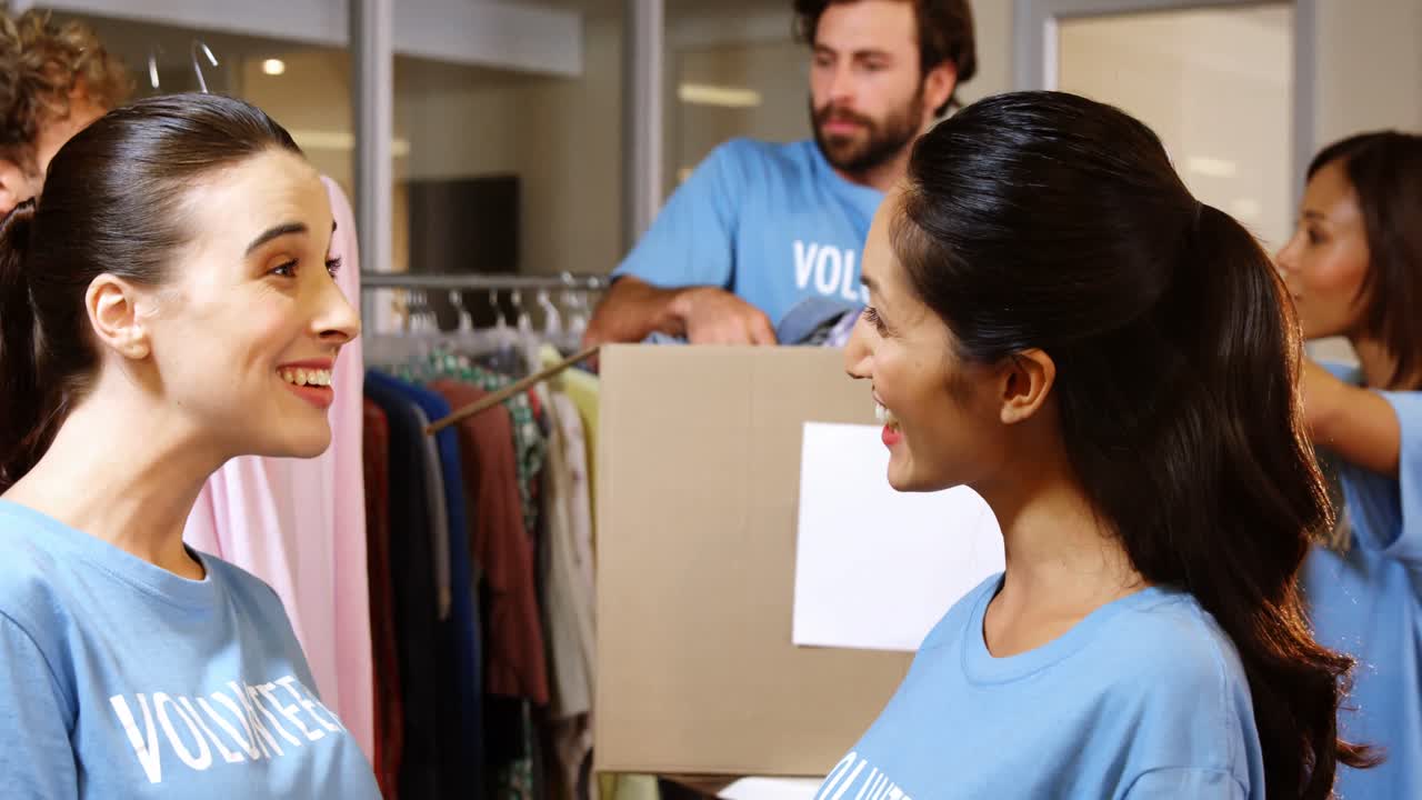 Female volunteer giving high five