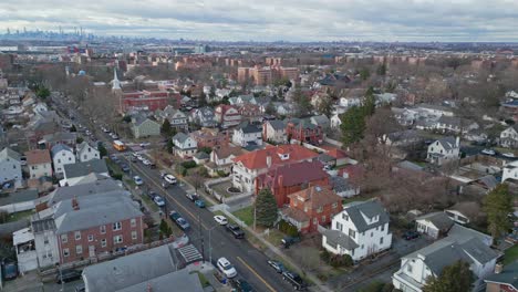 queens neighborhood with new york city in background, usa